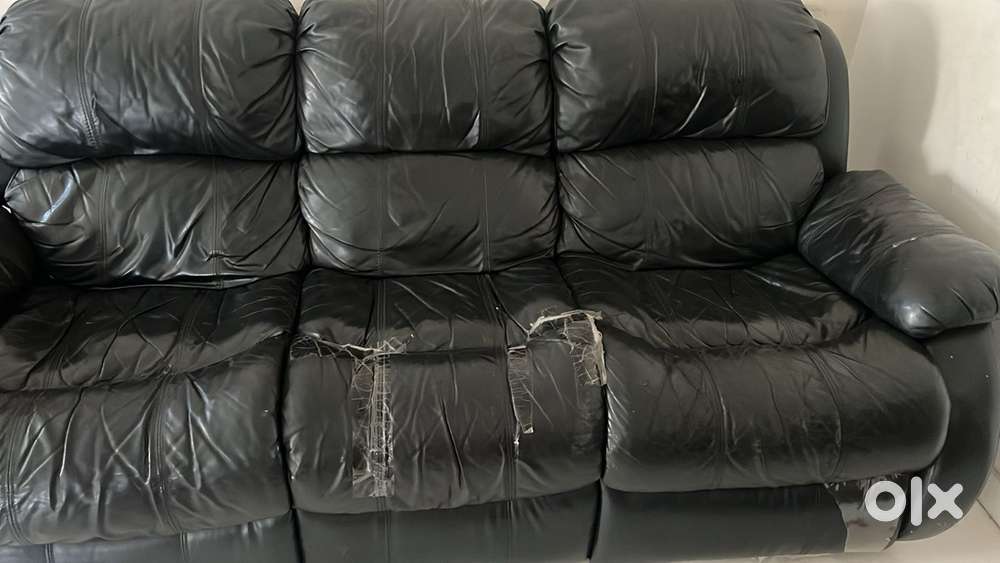 3 seater sofa  with 2 recliners in the corner
