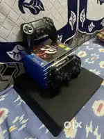 Ps4 slim 1TB with 2 controllers and many games