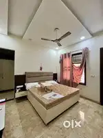 PG Room for girls with Balcony, AC, Geyser & Kitchen Access