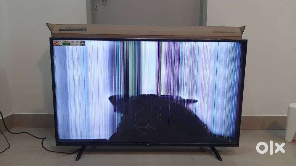 New Broken MI TV for parts