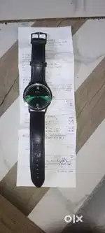 Titan green dial watch