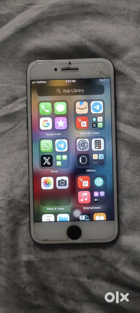 iPhone 7 with charging cable