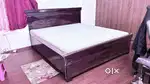 fancy wooden beds at throw away prices