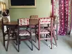 Pure teakwood dinning table with 6 chairs.