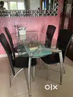 Glass top dining Table - 4 years old
