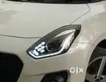 Swift. Car headlight  top model  1 month old with bil box