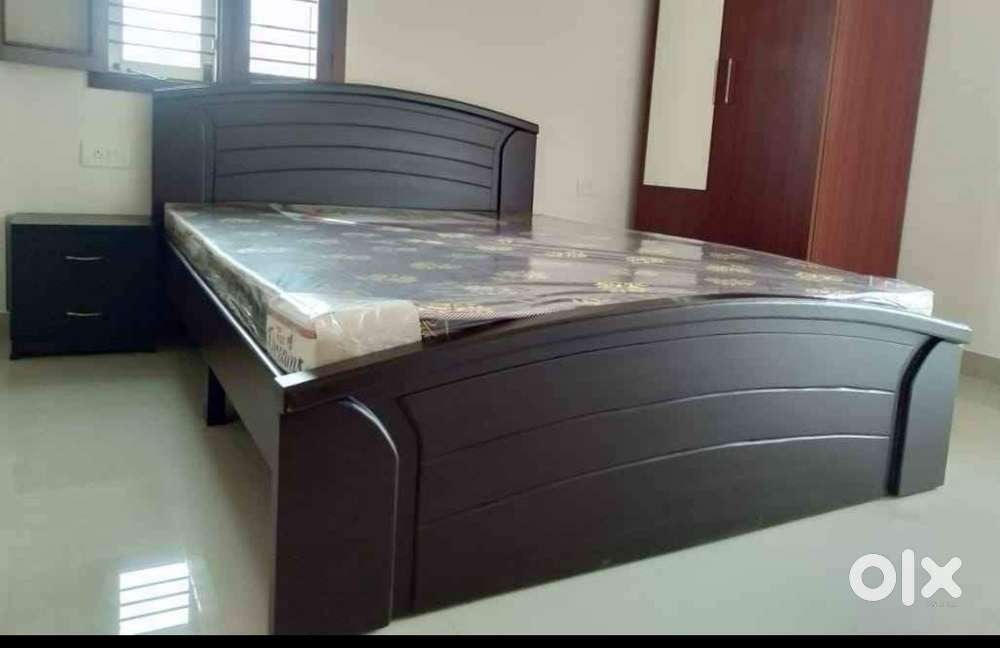 Band new bed with mattress qeen size