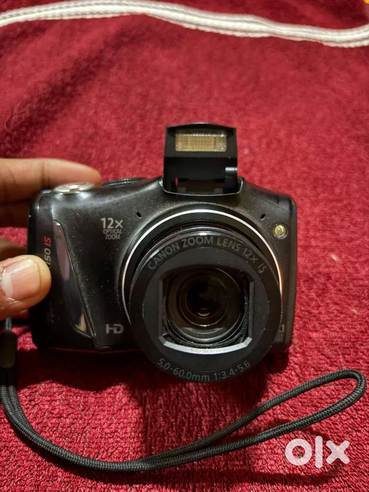 Canon Poweshot 150IS with sealpack Envie Rechargable Batteries & 32gb