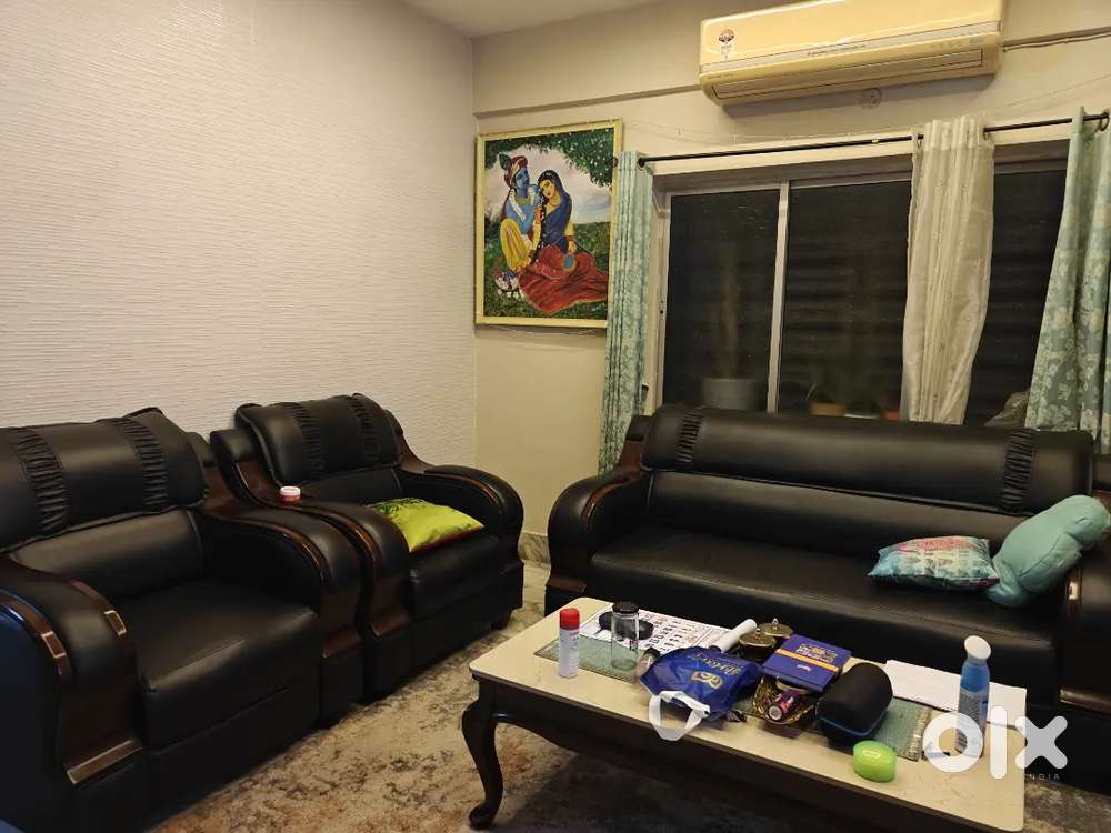 Black Leather Sofa with Centre Table