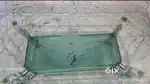 Glass centre table (5 × 2.5 feet )