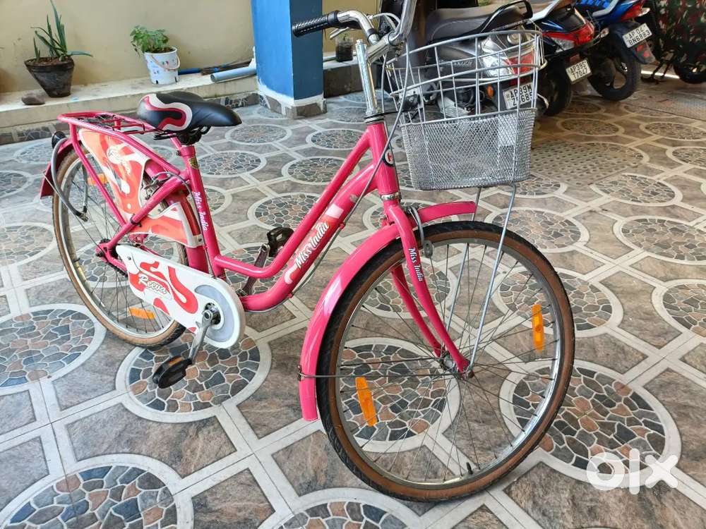 Two ladies cycles one big one small