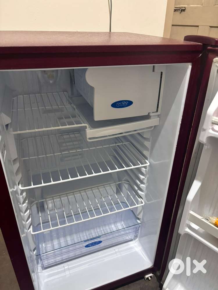 Small fridge with ice chamber and defrost feature