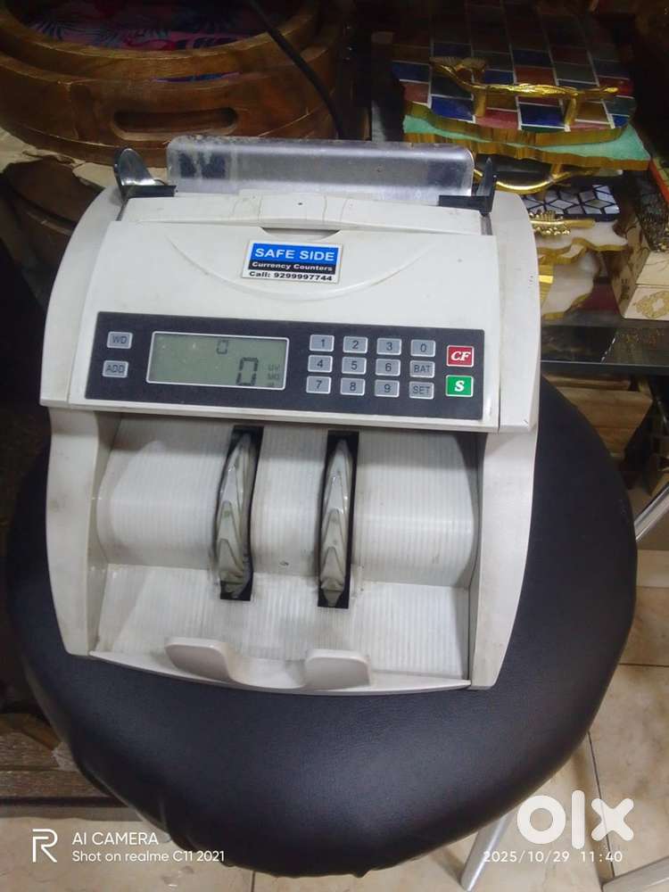 CASH COUNTING MACHINE