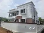 AN ELEGANT NEW 4BED ROOM 2200SQ FT 6.3CENT VILLA IN KOLAZHY,THRISSUR