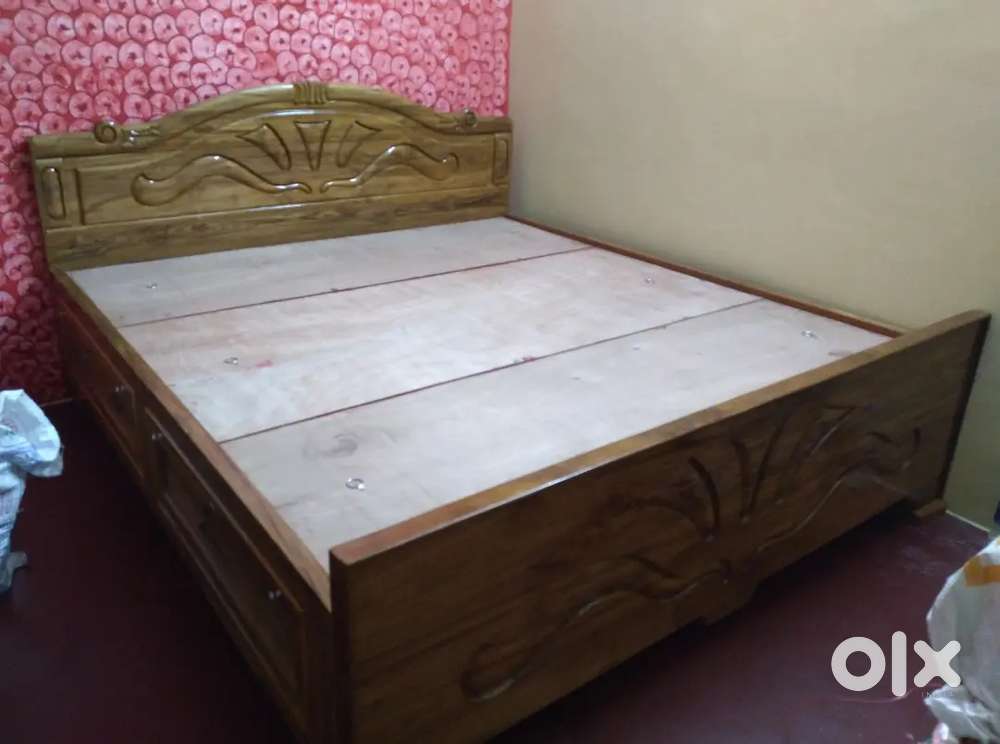 Segun wood storage bed maker