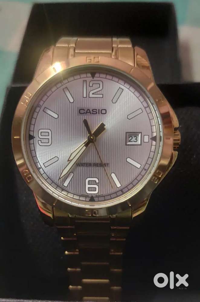 Casio wrist watch for men gold case