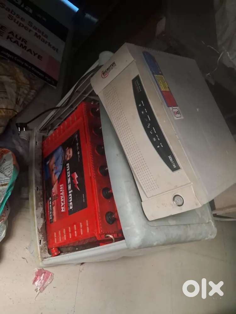 Inverter with two batteries