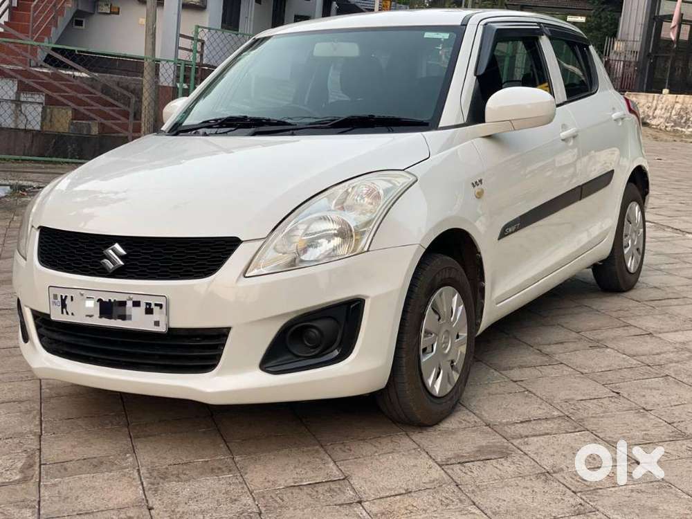 Maruti Suzuki Swift LXI Optional-O, 2016, Petrol