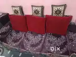 A 3+2 sofa set with glass center table.