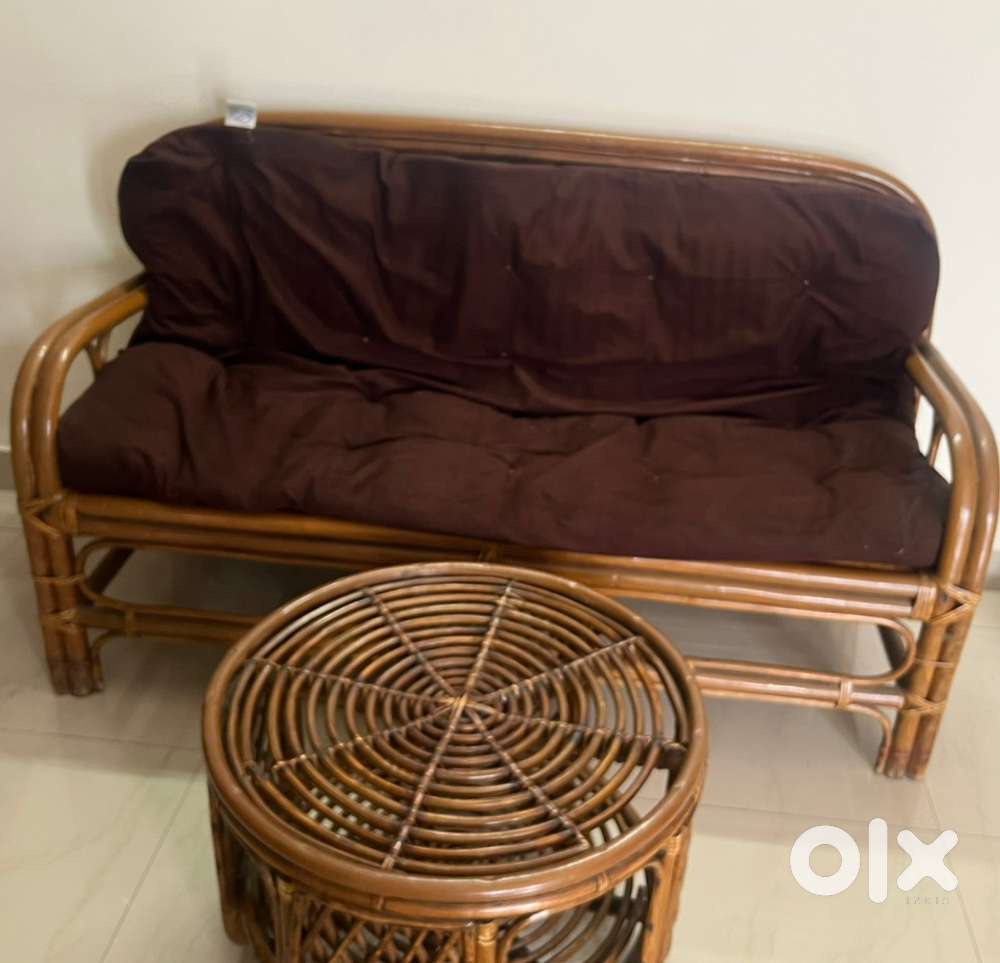 Cane sofa with table