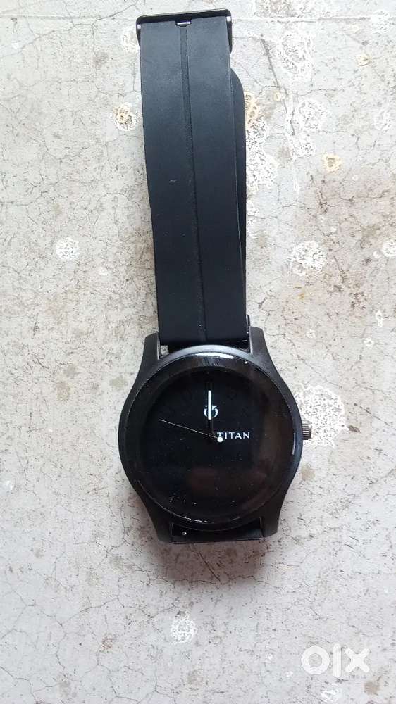 TITAN watch h original h water resistant bhi h magnetic strip h