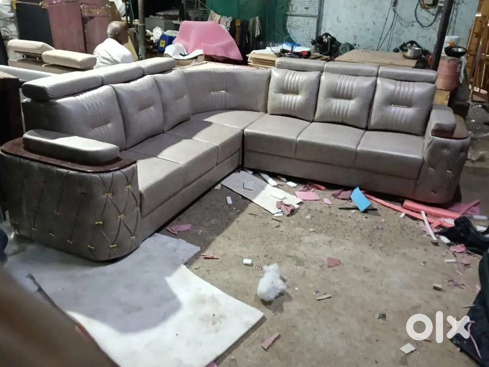 L shape sofa set with attached pillows with comfortable headrest