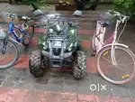 125cc ATV and 2 bicycles