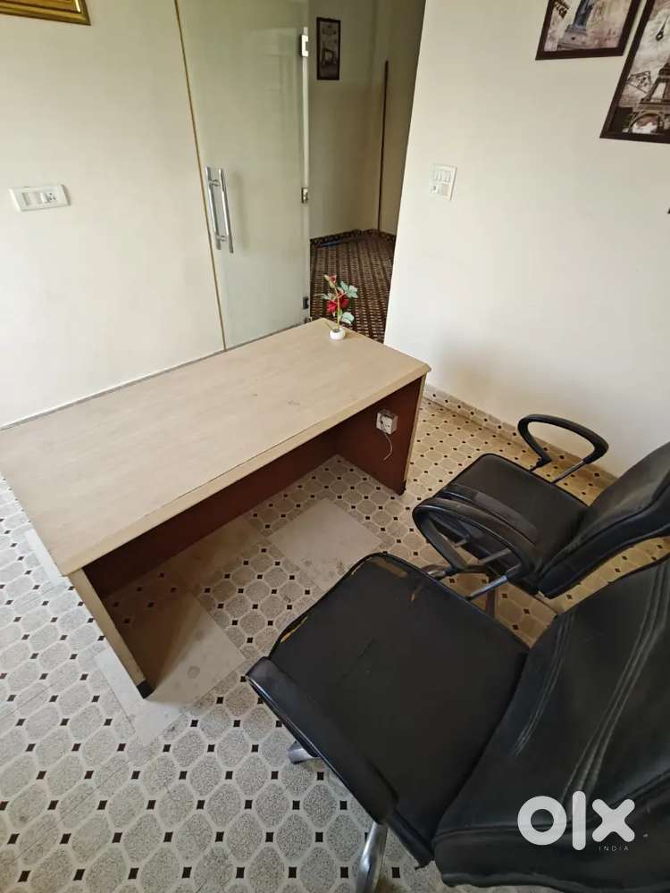 Office table and rolling chair