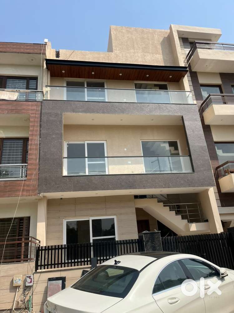 Kothi for sale in C block next to park triple story