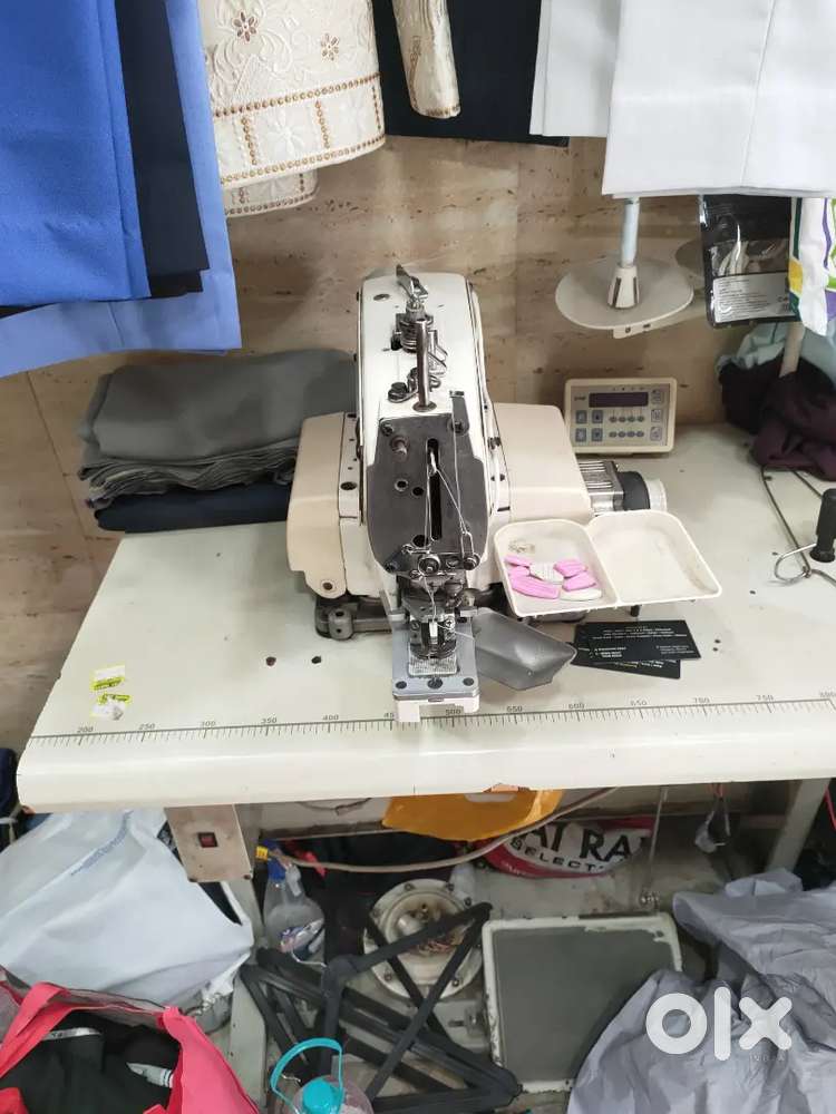 Kach button machine