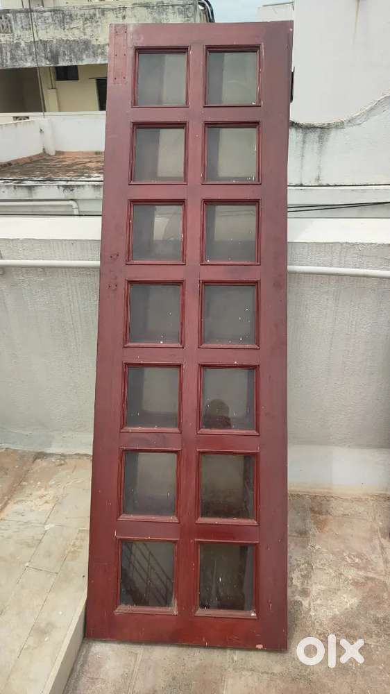 Teak wood door with glass frames