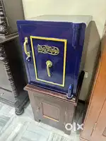 Antique iron safe with rosewood base