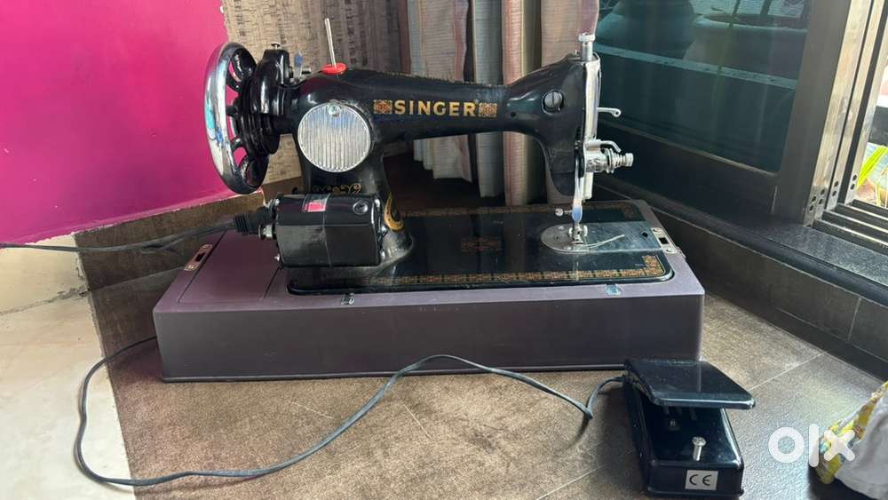 Sewing Machine  with foot pedal  Brand - Singer