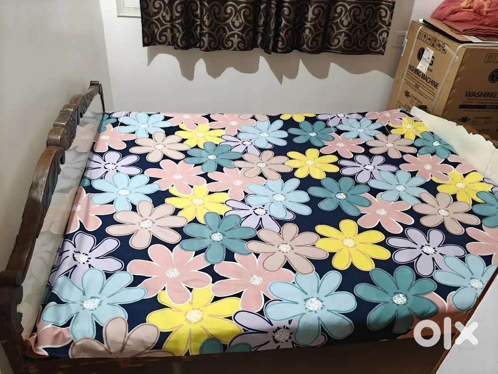 Queen size wooden bed