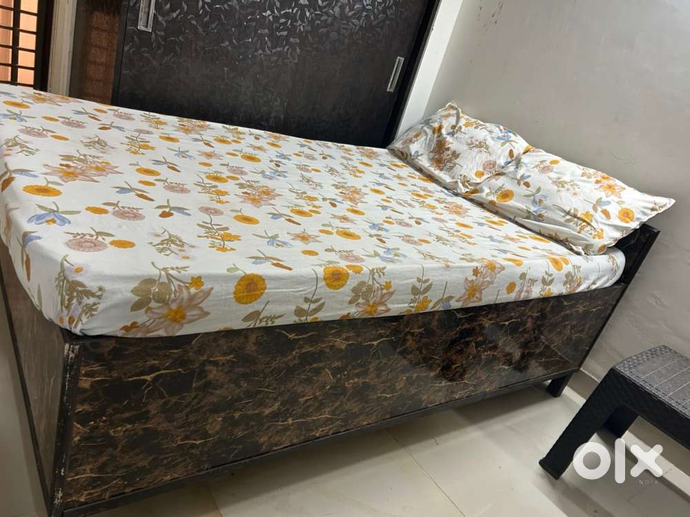 Old queen size bed with mattresses
