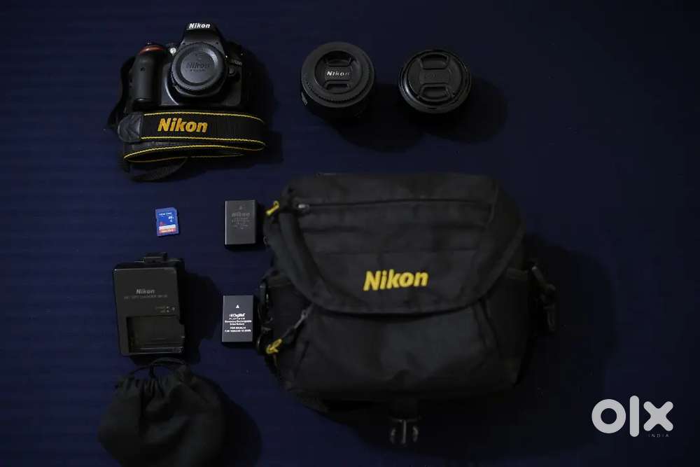 Nikon D5200 DSLR Camera with 2 Lenses and 2 Batteries.