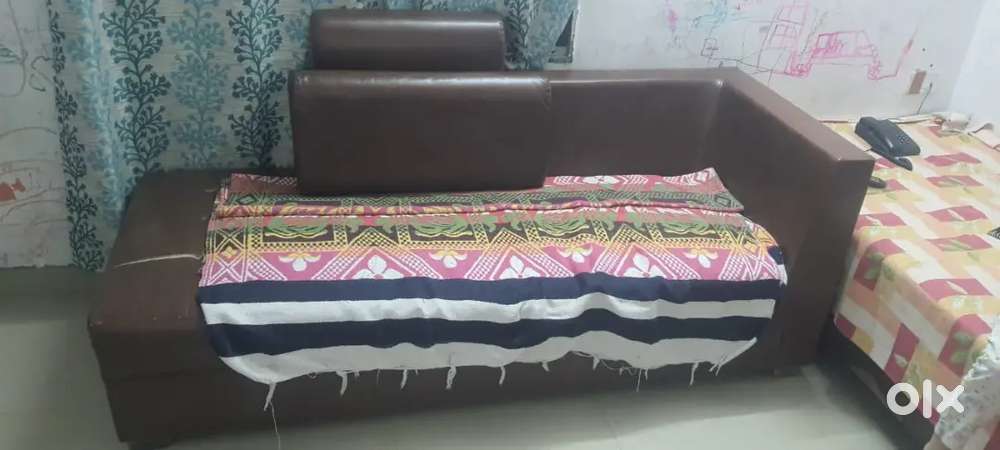 L shape sofa with glass table and 2 stylish stools