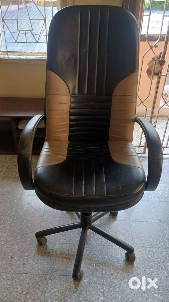 Great Chair with Cushiond High Back Revolving and Rolling. Good condit
