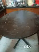 Round table in good condition made of iron and wood