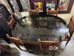 Teak wooden dining table with 6 seat chair ,glass counter top