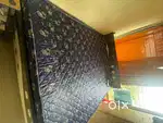Wooden bed with orthopaedic mattress