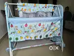 Baby cradle with swing and mosquito net