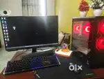 A gaming pc and a samsung monitor and elgato camera