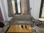 5 seater sofa with cover and centre table