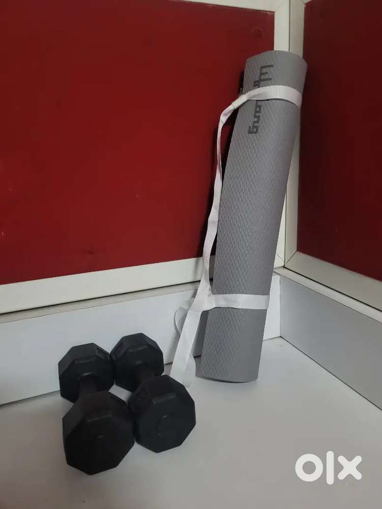 Yoga mat and dumbbells