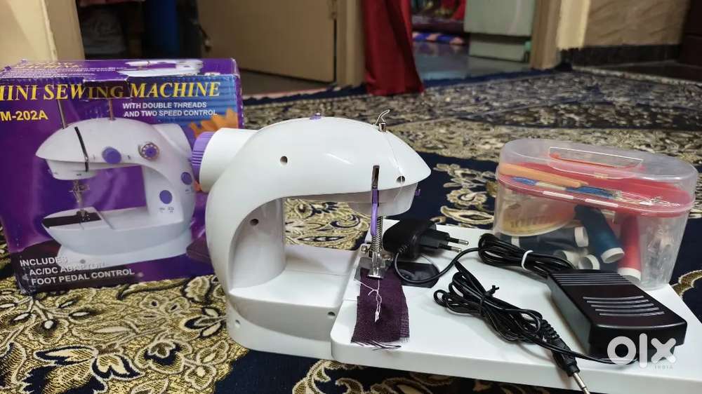 Mini sewing machine new box piece