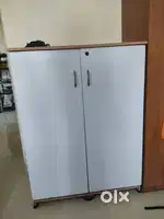 3 Door white cupboard 5' by 4' for sale Rs 2000. Must sell by 15-Sept