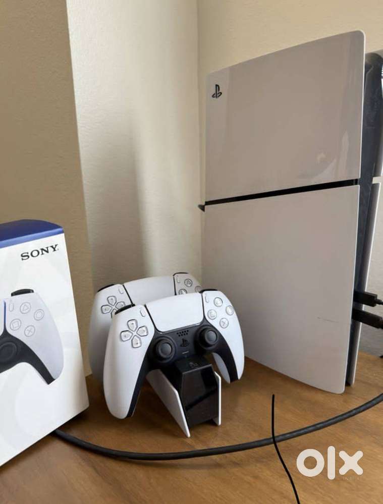 Playstation 5 with pad and games