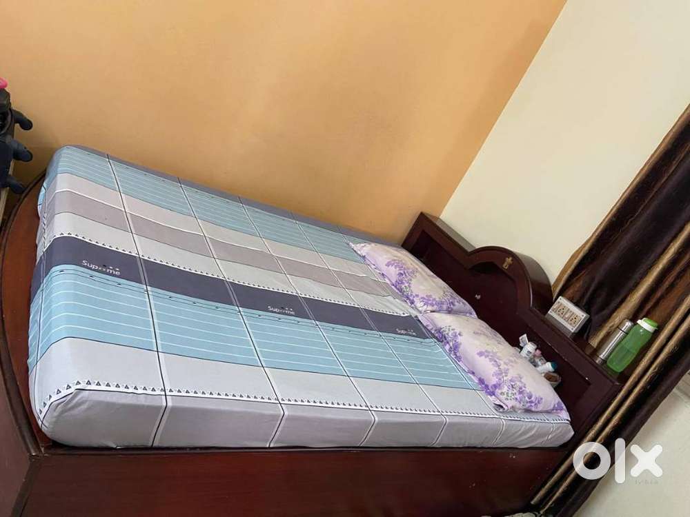 Queen size, wooden bed with storage box and red mattress included