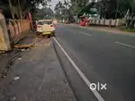30 cent with a house at kothanalloor  ktm Ekm road  130 feet front